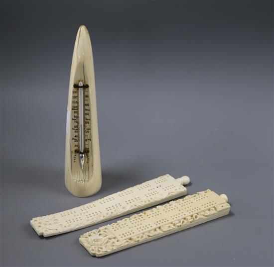 Two 19th century carved ivory Chinese cribbage boards and an ivory thermometer (3)